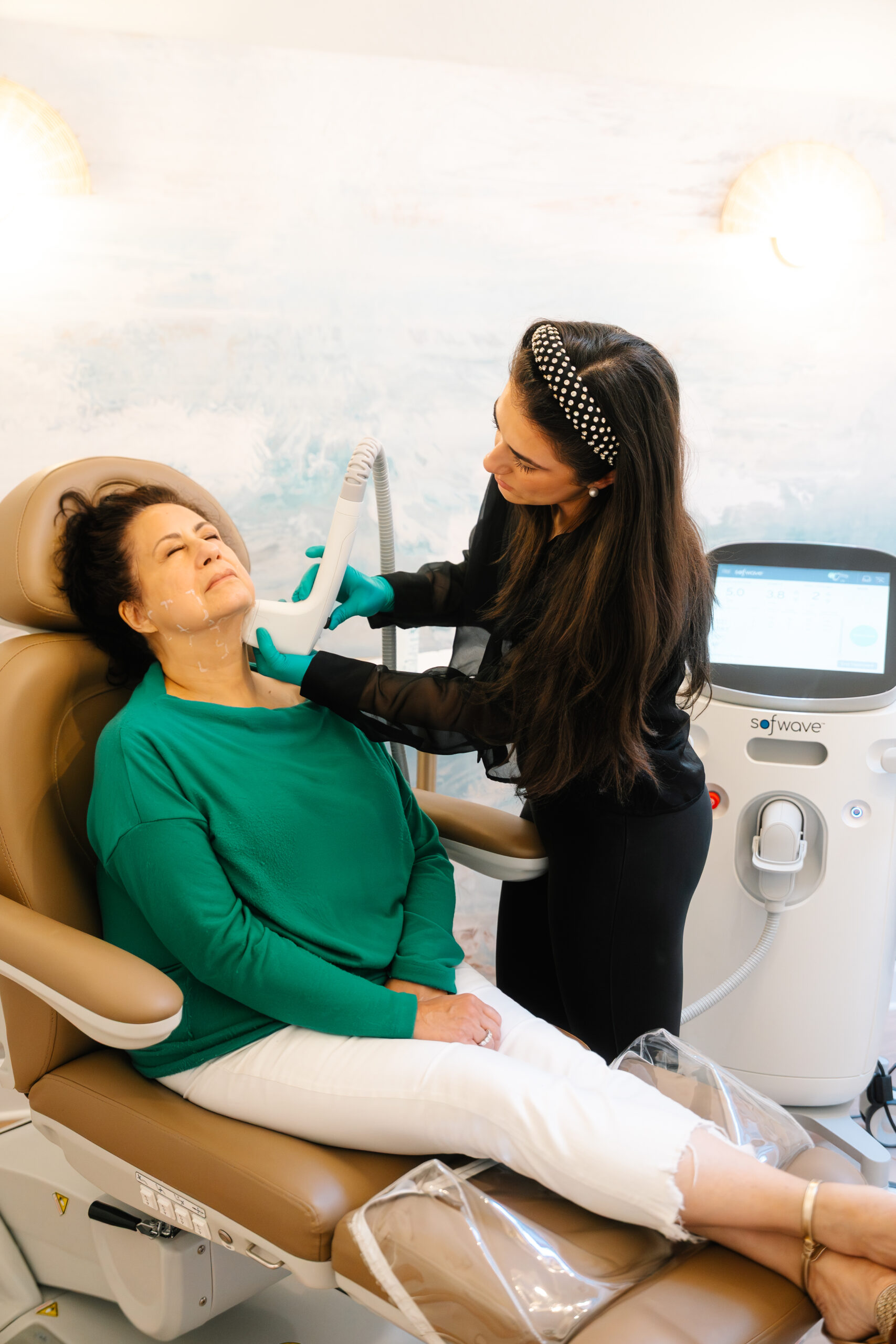Brisa Aesthetics provider performing a Sofwave facial treatment