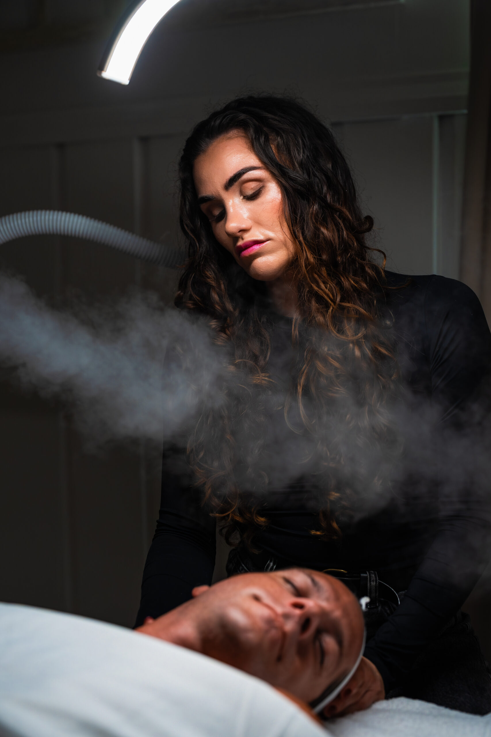 Briana providing aesthetic care for a male client at Brisa Aesthetics